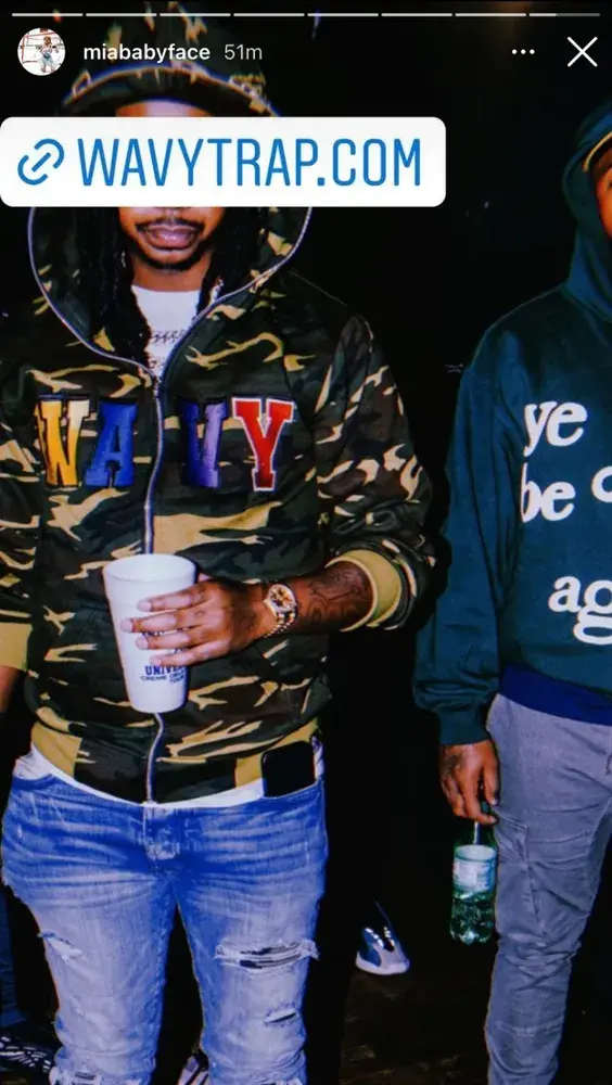 Archived social story showing a WavyTrap.com link over WavyNavy collection imagery.