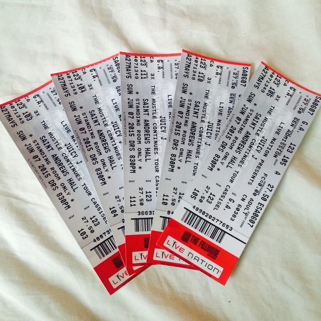 Several printed Live Nation tickets for The Hustle Continues Tour.